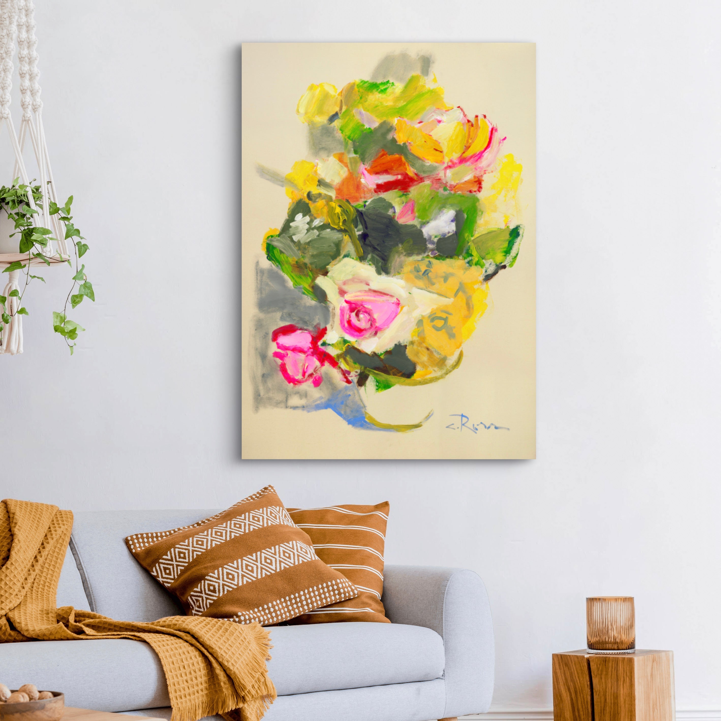 Living room with a colorful abstract painting on the wall above a sofa.